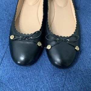 Ralph Lauren black flats with gold embellishments and scalloped edges